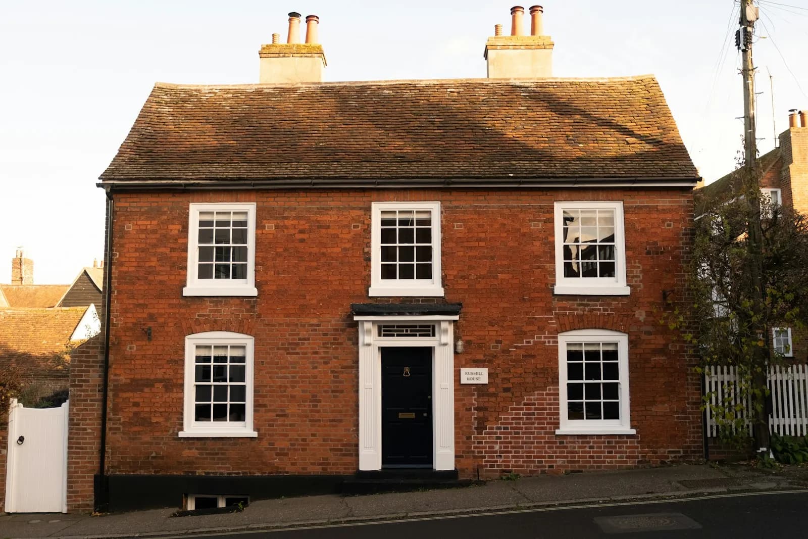 The front door of a traditional UK family home — the asset families weigh up when councils offer a Deferred Payment Agreement against care home fees.